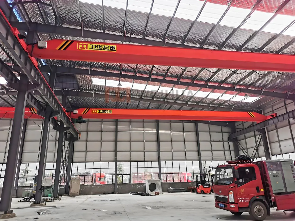 Overhead cranes installed in an operating workshop